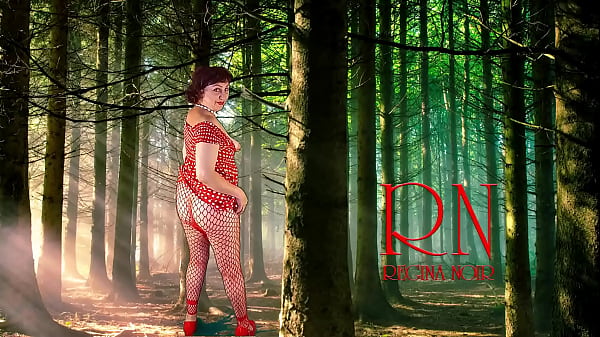 Pin-up lady posing in the forest. She shows her tits and pussy. Mesh tights. Regina Noir