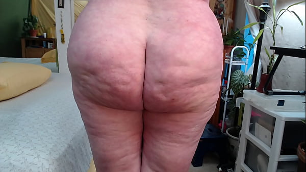 1014 Redhead mature DawnSkye loves to show off her amazing ASS. Watch how I make it bounce and shake