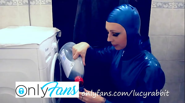 Let's wash laundry dressed in blue latex catsuit  