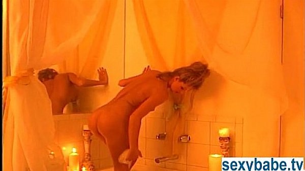 Busty pornstar chick masturbating in bath