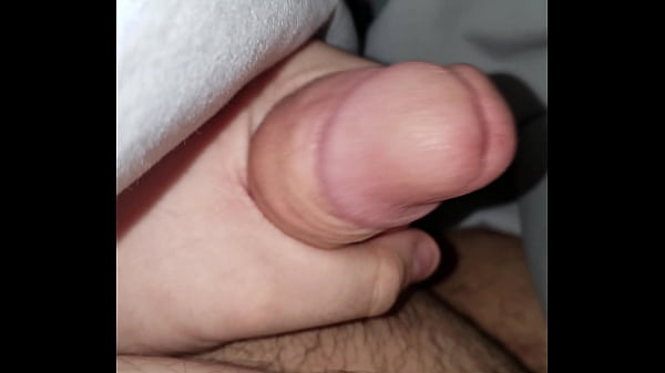 Jerking off and precuming a little.  