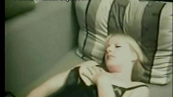 sexy blonde lady in black lingerie masturbating