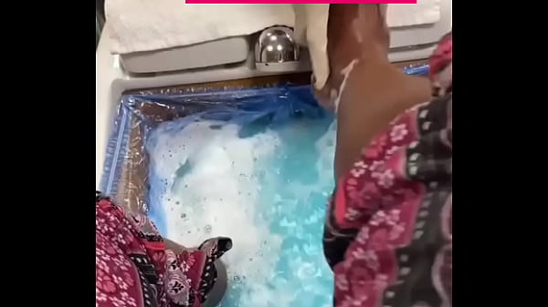 Ebony feet in water