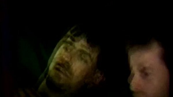 Two straight working men put condoms on