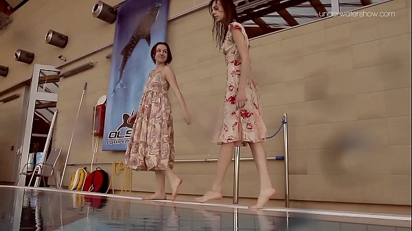 Two hotties swim naked