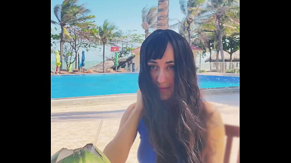 Sexy beauty girl and coconut. Poolside beautiful alert!  