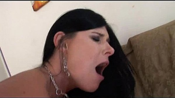 This sexy brunette milf is riding a big hard cock