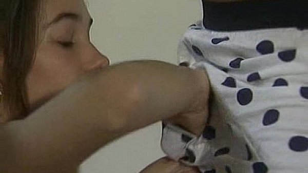 Young girl in white sneakers