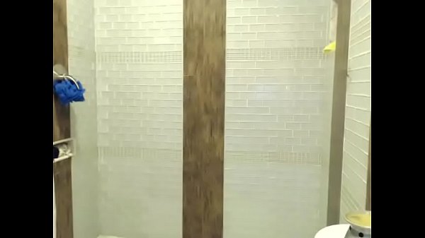 Latina woman taking shower live show