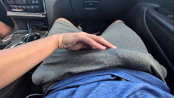 rubbing his cock in his shorts in public