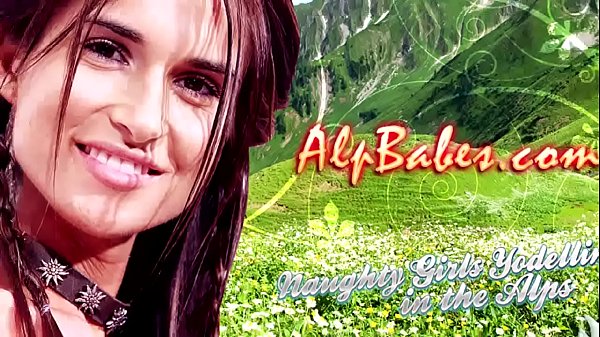 Long-legged brunette warms the Alps