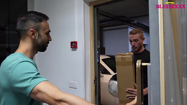 The delivery man gives me his package