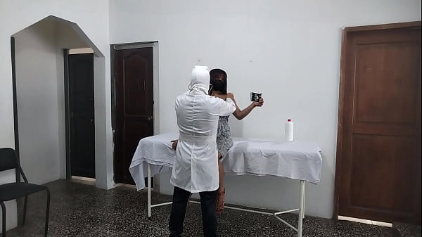 Perverted doctor fucks female patient while husband waits outside the doctor's office