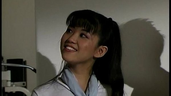 Two guys with extra large dicks stuff a pretty Asian teen in a DP porn video