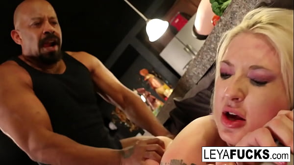 Blonde babe gets a huge black cock while he watches