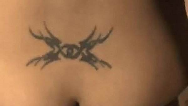 Girl gets ass Tattooed