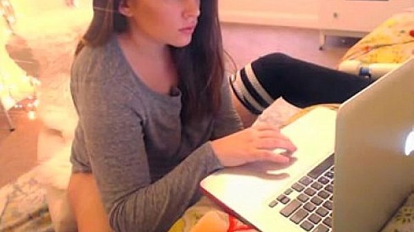 pretty white girl on macbook while camming