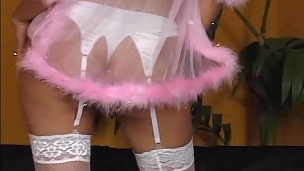 Justin masturbates in stockings and a garter belt