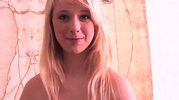 Cute girl puts dildo in her pussy