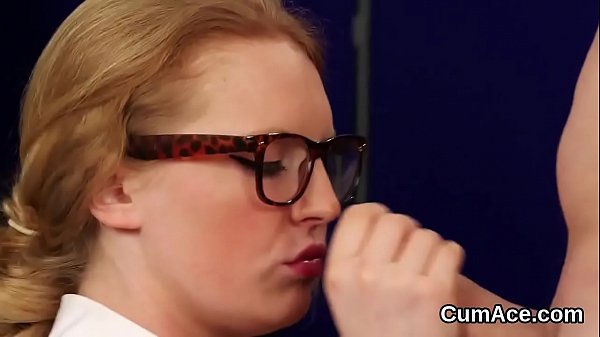 Hot looker gets cumshot on her face sucking all the jism 