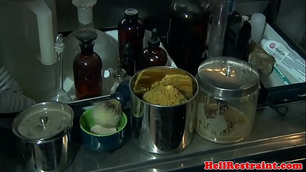 Tied down sub kinky water play