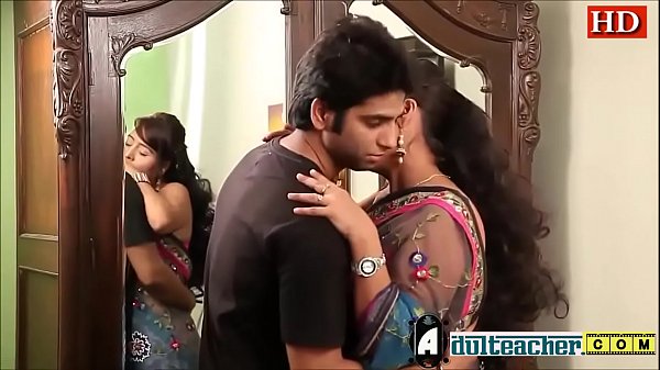 Indian hot teacher in pink bra and sari seducing young boy -Adulteacher.com