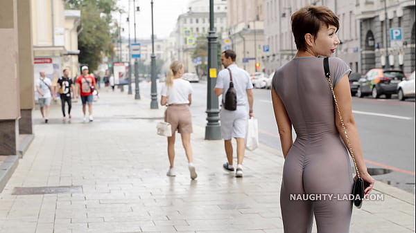 Naughty Lada wear see-through outfit in the city.