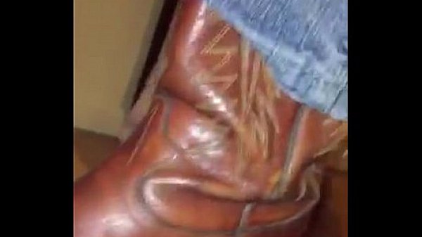 Cowboy tramples slaves cock with dirty boots