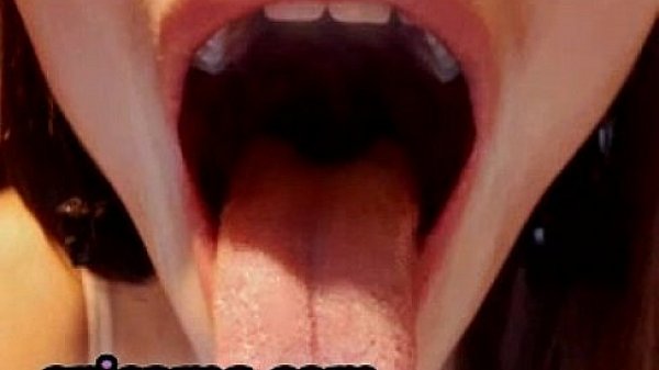 Skinny redhead gagging on a dildo (2)