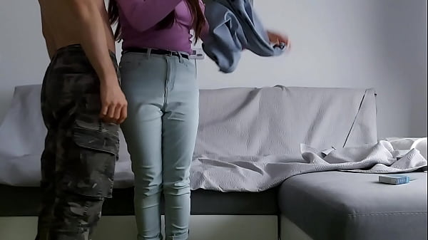 Romantic young couple have passionate and intense sex on the couch