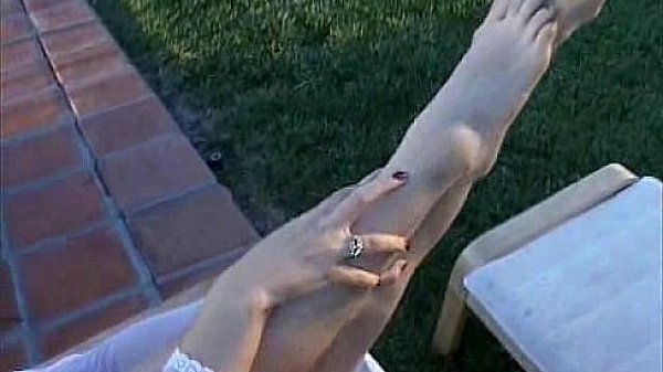 housewife plays with a huge dildo 