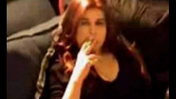 Smoking Shemale t-girl Michelle Love pleasuring herself smoking and stroking5 