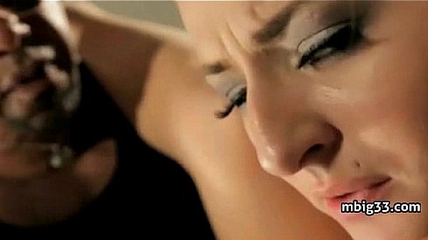 Oiled up hottie fucks a big black cock  