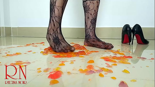 Sweet jeles destroying with high heels shoes on the floor. Full video