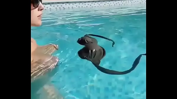 Amanda Cerny in the pool showing tits