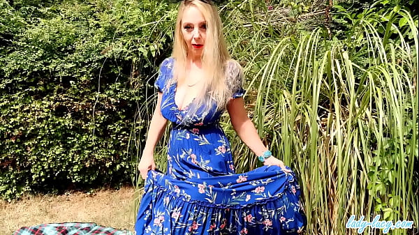 Lady Lucy outdoors in big hot tits cocktease