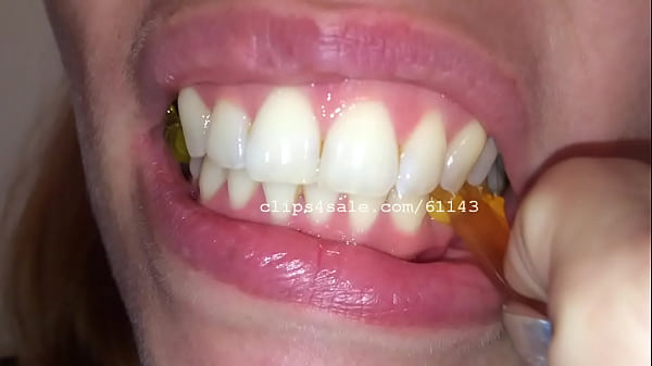 A Sexy Girl Chewing Candy