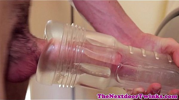 Masturbating twink toying his meat shaft