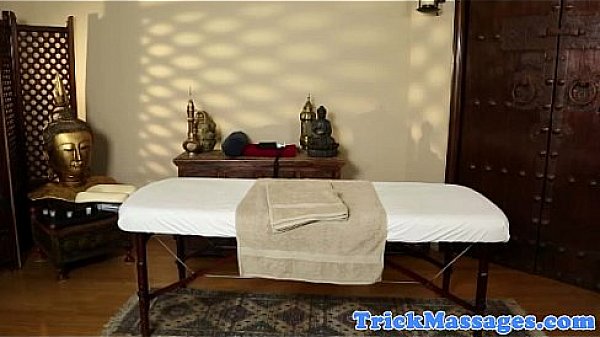 Busty massage babe naked on the table