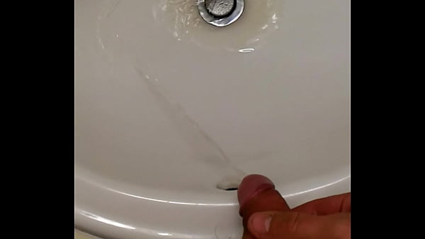 Pissing in hotel bathroom sink  