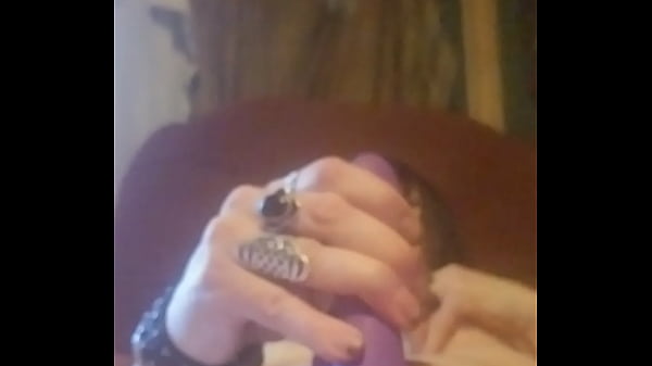 Hot goth Chick plays with self & toys