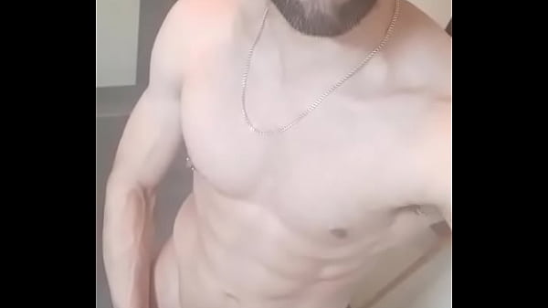 Guy teasing before shower  