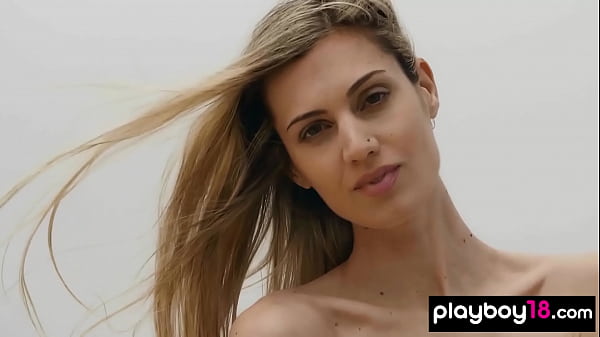 Petite european blondie taking off her sexy swimsuit outdoor