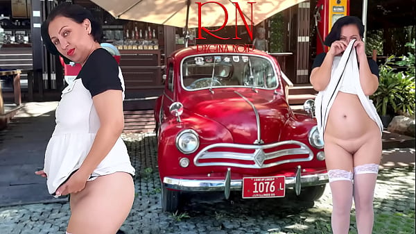 Double Regina Noir. A pretty lady in a short dress shows a striptease. Pussy and ass.  