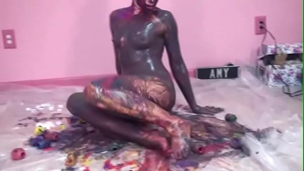 Teen Lina with perky tits exhibits her body as colorful art on floor