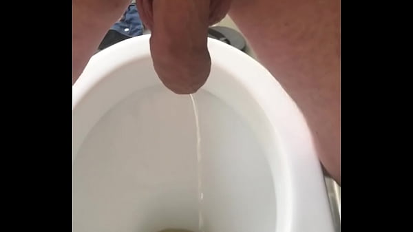 Pissing in toilet