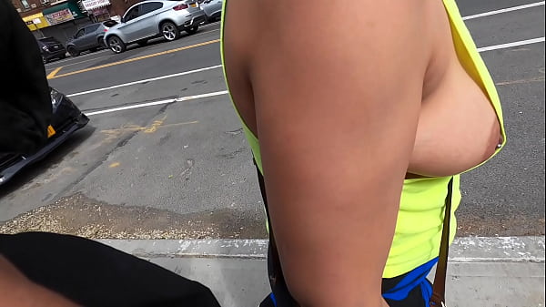 Wife walking  in public braless with nip slipping out