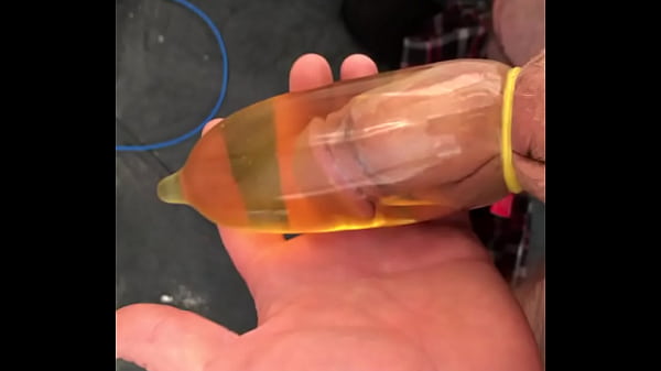 Filling a rubber full of piss