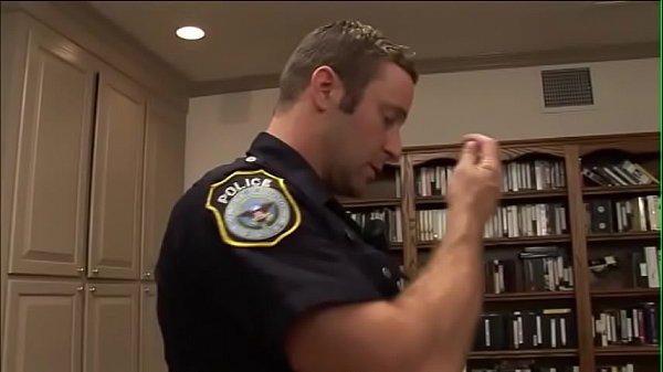 Slutty babe welcomes policeman and fucks him near the book shell