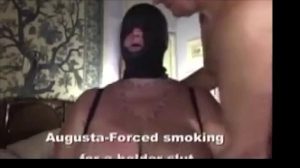 Slut wife bound, hooded and to smoke with a long holder  